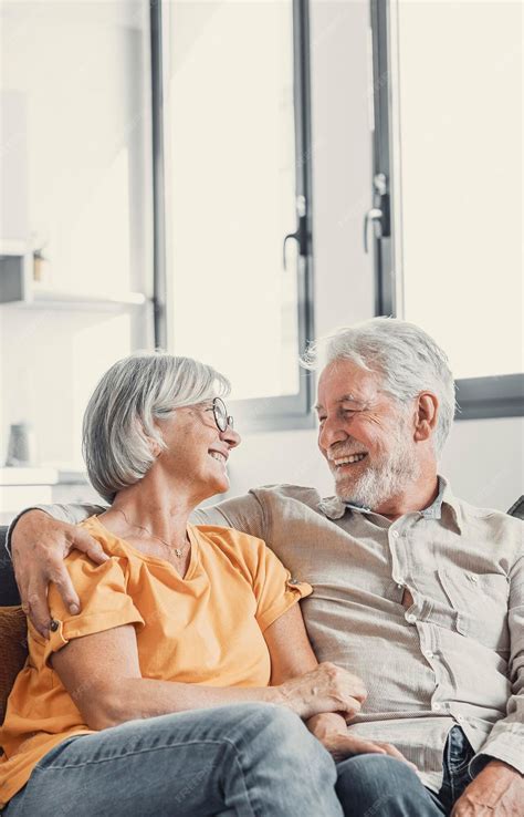 Premium Photo | Happy laughing older married couple talking laughing
