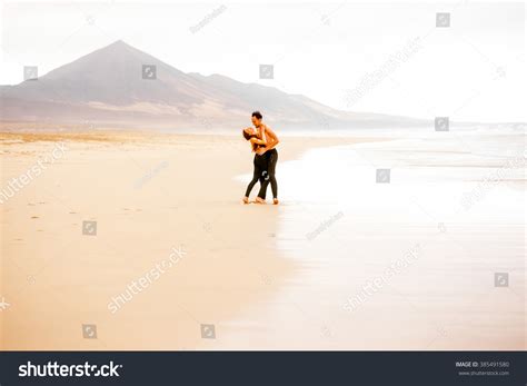 young couple naked torso embracing  stock photo edit