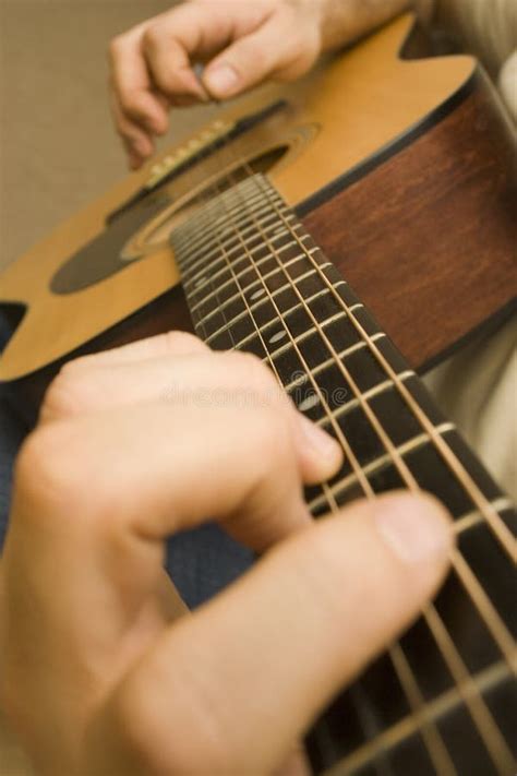 playing guitar stock photo image  musician macro fretboard