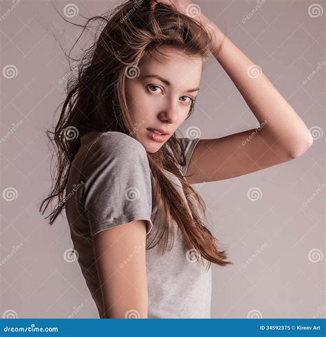 Young Sensual Model Girl Pose in Studio. Stock Image - Image of