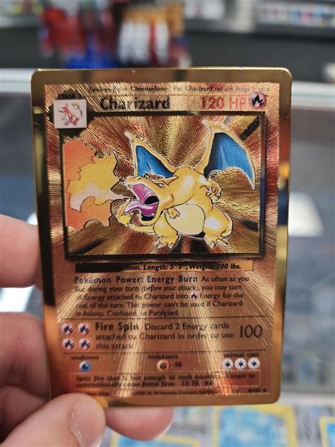 Mavin | Gold Metal Plated Charizard Pokemon Card!!-