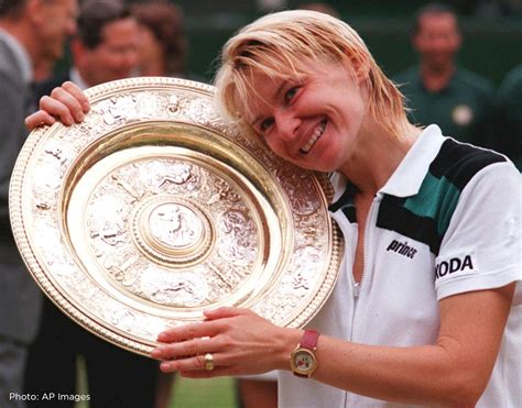 Download Jana Novotna Resting on Wimbledon Trophy Wallpaper