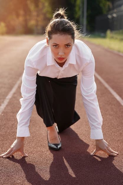 photo front view woman running  suit