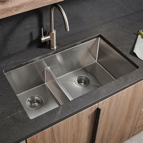 Ruvati 32-inch Undermount Kitchen Sink 30/70 Double Bowl 16 Gauge