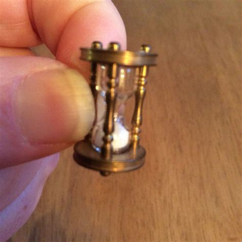 Brass egg timer bought off eBay from magicminiatures. The sand actually