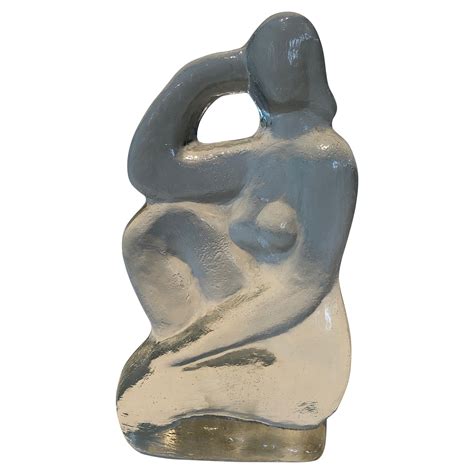 Glass sculpture representing a naked woman posing in the French Art