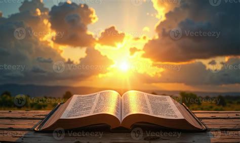 open bible divine light dramatic sunset sky god  stock photo