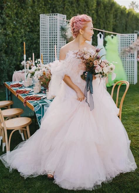 35 Best Blush and Pink Wedding Dresses We’re Obsessed With