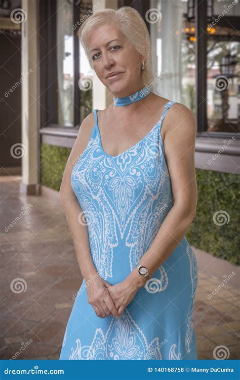 Curvy Mature 42-Year-Old Blonde: Confident Beauty Redefining Age and Style