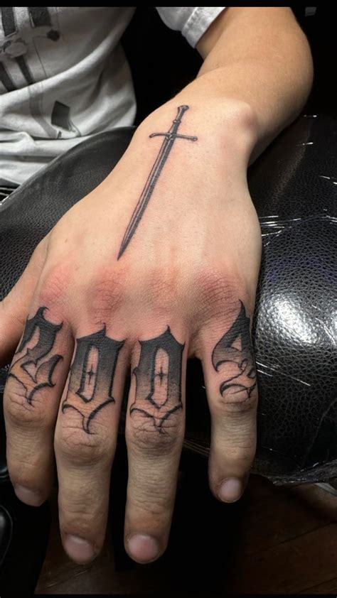 2004 hand tattoo | Hand tattoos for guys, Hand tattoos, Hand and finger ...