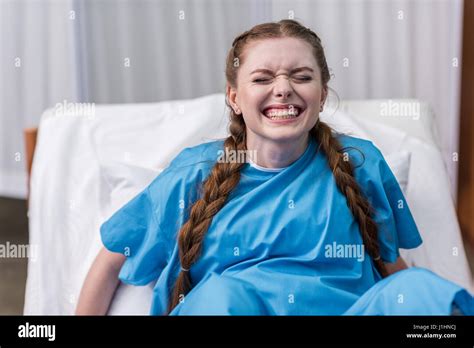front view of pregnant woman giving birth in hospital Stock Photo - Alamy