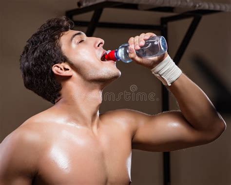 Thirsty Man Drinking Water in Sports Gym Stock Photo - Image of power ...