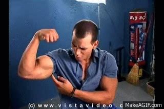 Muscle stud flexing his bicep on Make a GIF