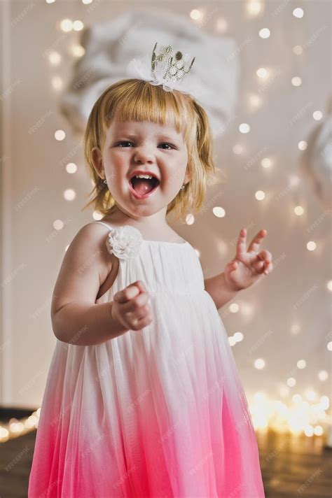 Premium Photo | The young girl smiles happily 5431