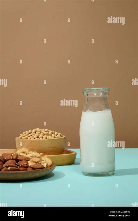 minimal scene   glass bottle filled  soya milk decorated
