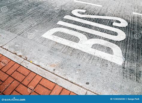 Bus Lane Sign on Asphalt Road Stock Photo - Image of color, safety ...