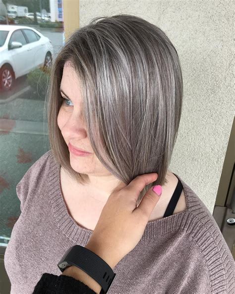 Added some grey highlights to help blend her natural grey hair ...