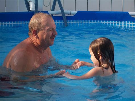Cool in the Pool | My baby girl and her grandpa enjoy a warm… | Flickr