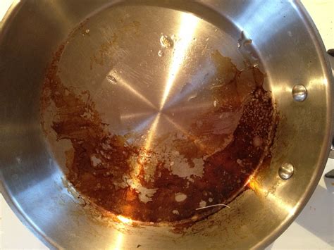how to clean burnt oil on stainless steel pan