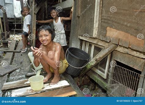 filipino children   rubbish dump  slum editorial photography