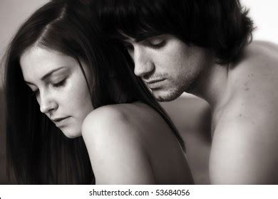 young passionate couple love hugging studio  shutterstock