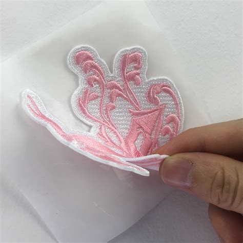 whats  differences  iron  backing  adhesive backing