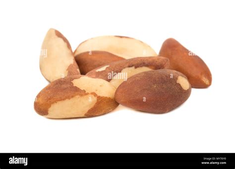 Small pile of Brazil nut on white background Stock Photo - Alamy