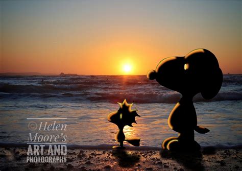 Snoopy & Woodstock walking along the beach at sunrise\" Combination of