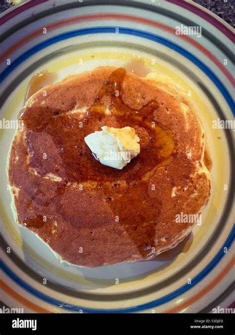 Pancakes and maple syrup Stock Photo - Alamy