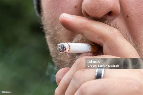 smoking  cigarette close  stock photo  image