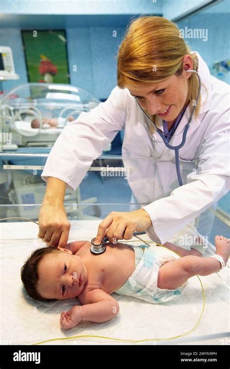 pediatrician examining newborn baby pediatrics hospital policlinica