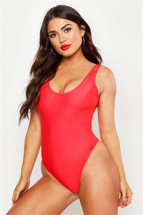 Selena Gomez channels Baywatch as she poses seductively in red swimsuit ...