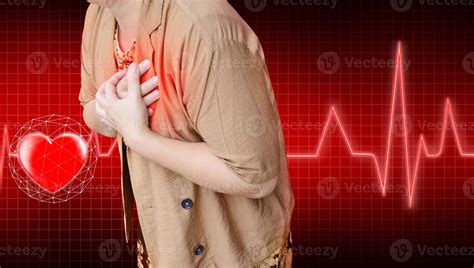 heart health pictures  woman holding  hand   chest