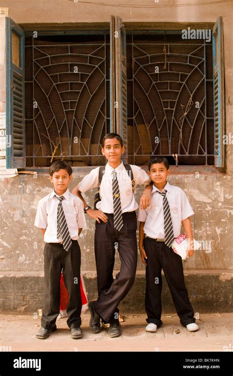 This is an image of three young Indian school kids in uniform in Calcutta, India Stock Photo - Alamy