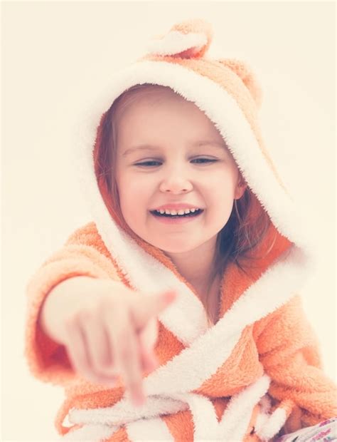 premium photo sweet child pointing    laughing
