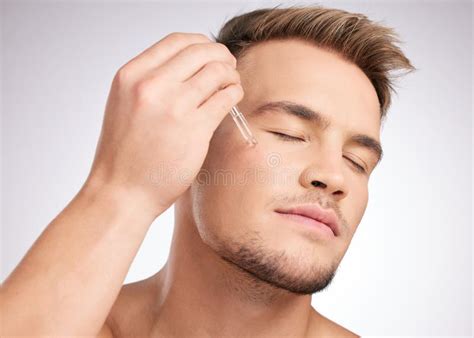 cosmetics man  liquid serum  face  skincare wellness