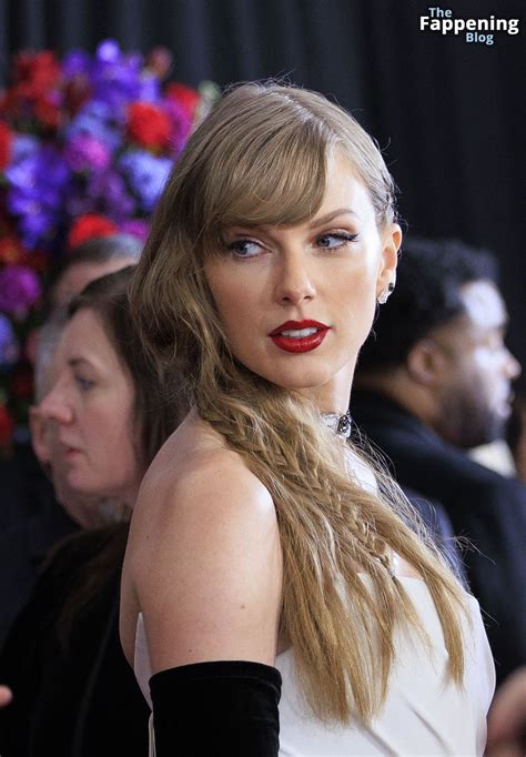Taylor Swift Wows In White Arriving At The 66th Annual Grammy Awards