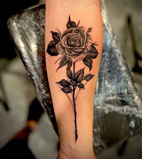 33+ AMAZING ROSE TATTOO DESIGNS THAT WILL STICK IN YOUR MIND1