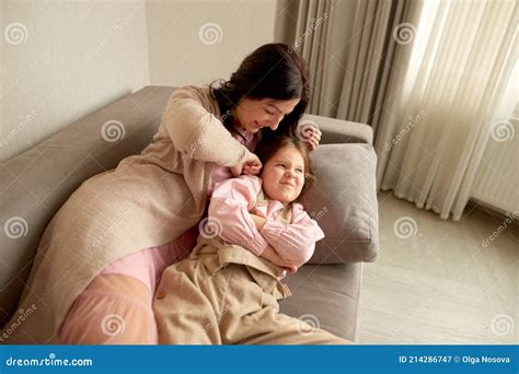 mom  daughter fooling   home mom tickles daughter lie