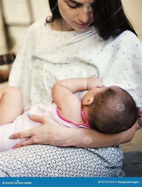 Mother is Taking Care of Her Baby. Stock Image - Image of motherhood