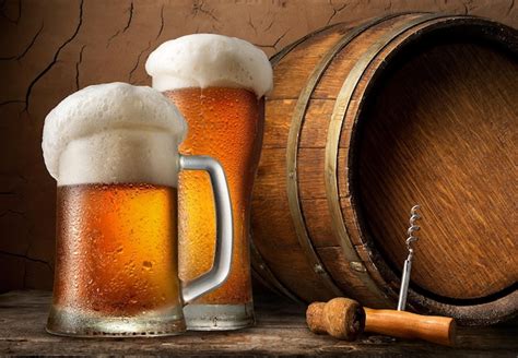 premium photo cold beer  wooden barrel  cellar