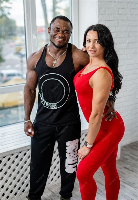 Premium Photo | Man and woman bodybuilders posing for camera. sporty