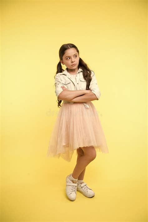 Fashion Model Agency for Kids. Child Keep Arms Crossed on Yellow ...