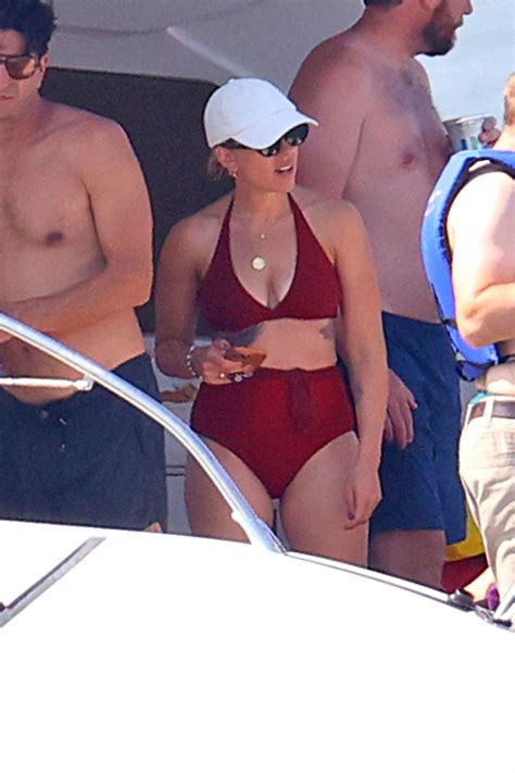 Scarlett Johansson shows off tattoos in red bikini in Hamptons
