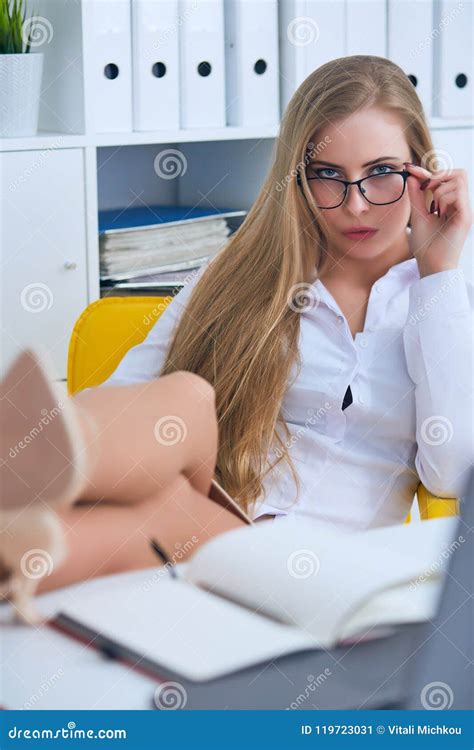 Office Flirt - Attractive Woman Flirting Over Desk with Her Coworker or Boss. Stock Image ...