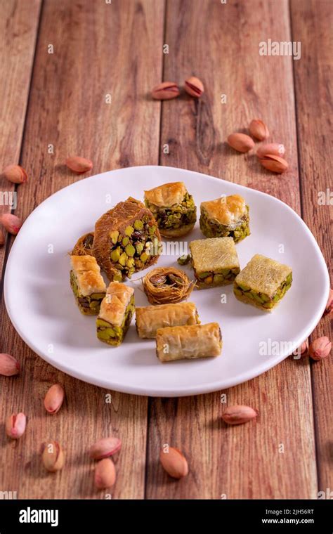 Mix pistachio baklava. Assortment of pistachio baklava on a wooden ...