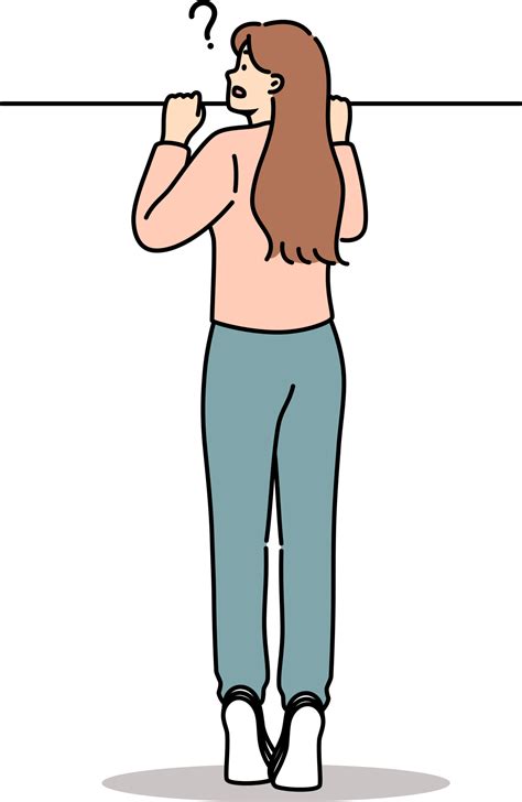 Curious woman peeks out from behind fence, standing on tiptoes to spy