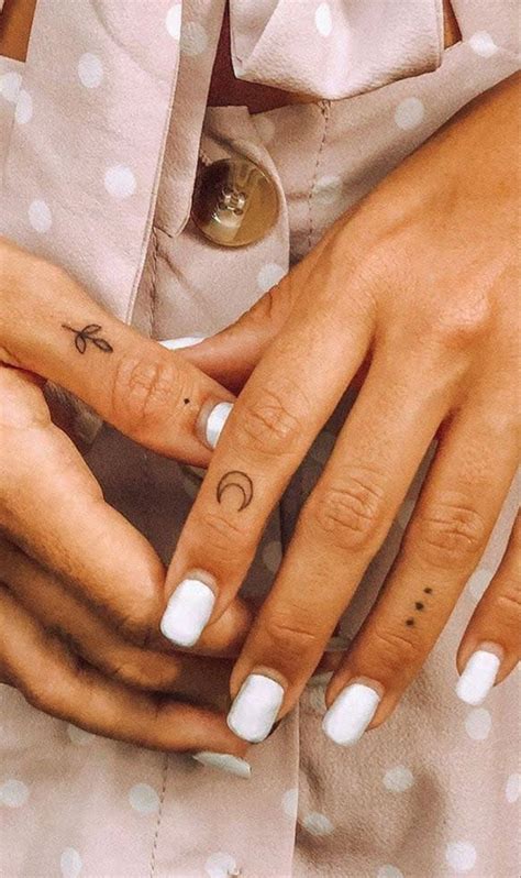 Moon in Forefinger Tattoo