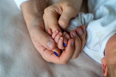 Father and Mother Holding Newborn Baby S Hand, Close Up Family Hold Hands Together Stock Photo ...