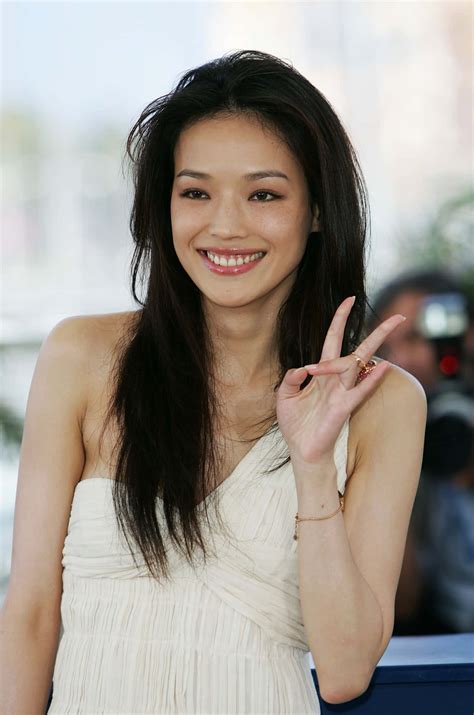 Download Stunning Shu Qi Posing Elegantly Wallpaper | Wallpapers.com